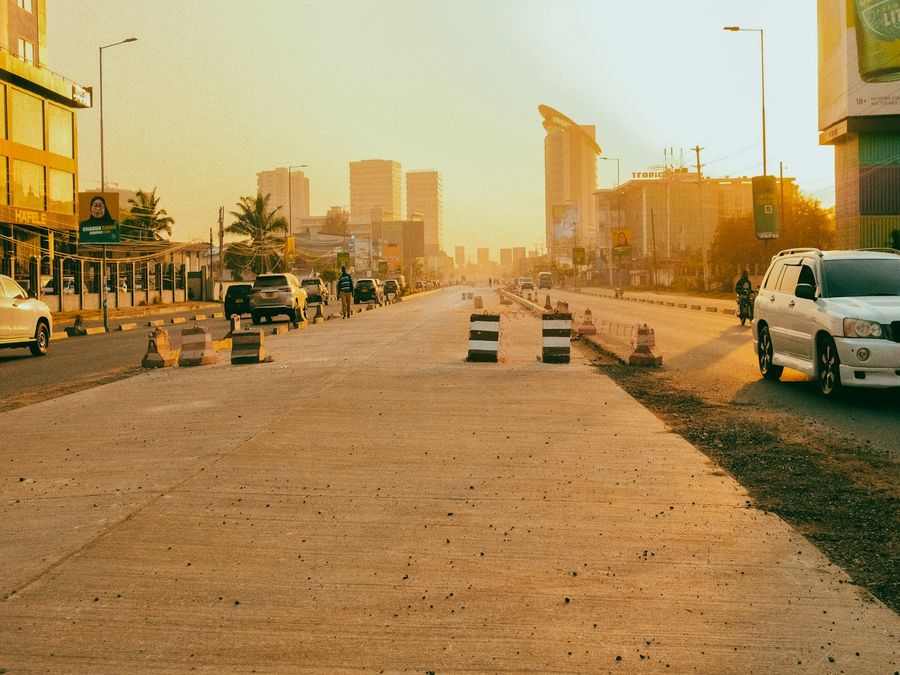 A road under construction with concrete barriers on Bagamoyo Road, Dar es Salaam